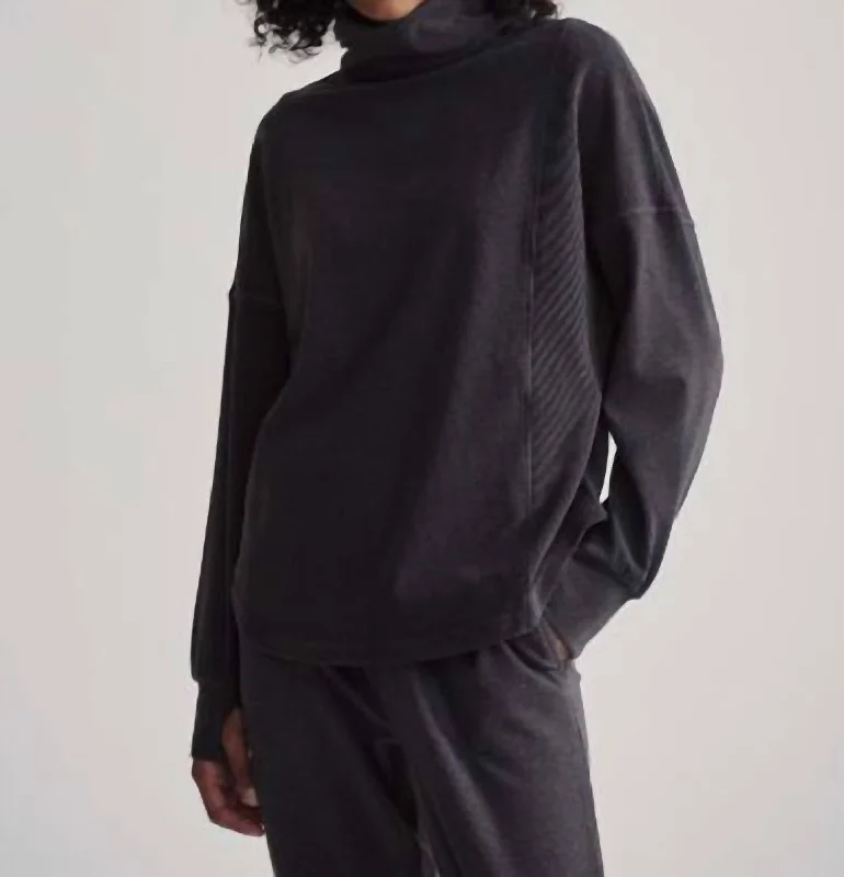 Rainer Roll Neck Midlayer In Black Marl